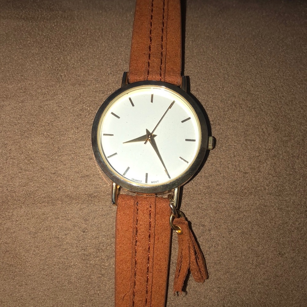 Francescas watch with tassle